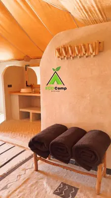 a room with a bed with mats on it at Eco Desert Camp in Merzouga