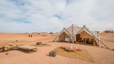 a tent in the middle of the desert at Erg Chebbi Desert Glamping in Merzouga