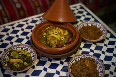 a group of bowls of food on a table at Dar Amazigh in Fès