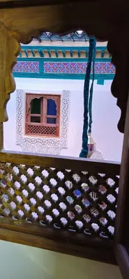 a wooden box with a display of a table with at Dar Amazigh in Fès