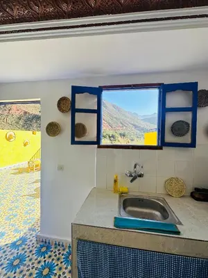 a kitchen with a sink and a window at Maison Berber in Ourika