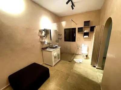 a bathroom with a sink and a toilet in it at Maison d 'Hôtes de Charme 7 Ch in Sidi Bouzguia