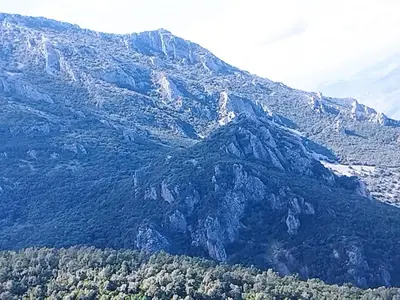 an aerial view of a mountain with trees at Gite touristique bouknala in Abinane