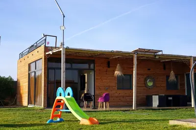 a small house with a slide in front of it at Getaway between nature and adventure in Marrakech