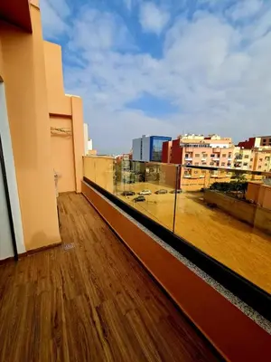 a balcony with a view of a city at Lusail in Beni Mellal