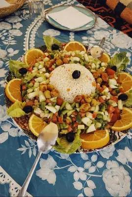 a plate of food on top of a table at Dar Mustapha&Linda GmbH desert-inspiration in Ksebt Ibourri