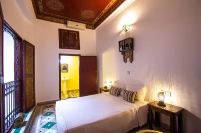 a bedroom with a bed in a room at Dar Bab jdid fez in Fès