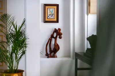 a statue of a bear on a shelf in a room at Villa Lumina in Marrakech