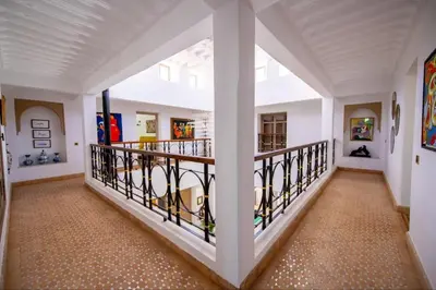 a hallway of a house with a balcony at Villa Lumina in Marrakech