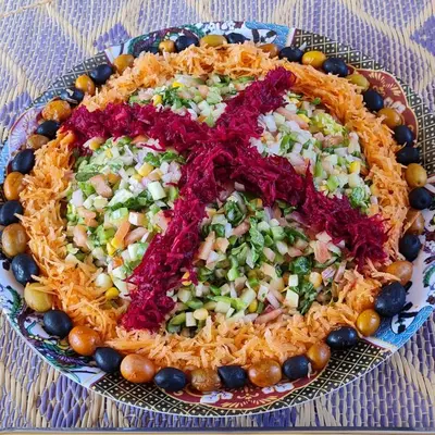 a plate of food with a cross on top at Sahara Escape tours in Mhamid
