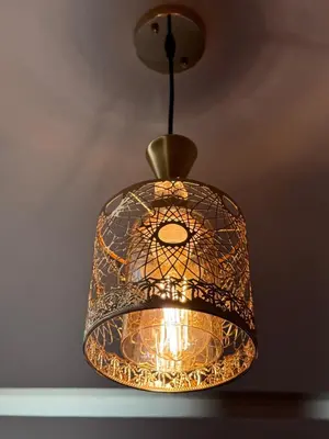 a pendant light hanging from a ceiling at Fes shore listings in Fès