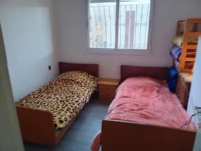 a room with a bed with a leopard print mattress at Appartement neuf équipé à Fez in Fès