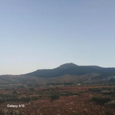 a view of the desert with mountains in the background at Maison d'Azur in Sidi Abdalwahad