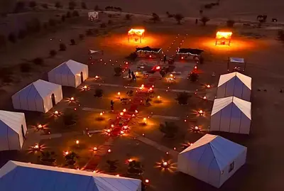 an overhead view of a parking lot at night at Erg Chebbi Luxury Package & Activities in Merzouga