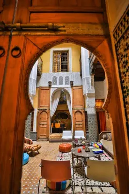 a view of a living room with a table and chairs at Fez Valley Luxury Camp in Fès