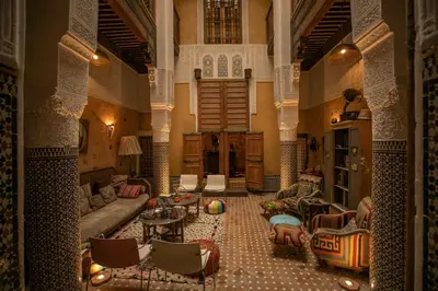 a large living room with a couch and chairs at Fez Valley Luxury Camp in Fès