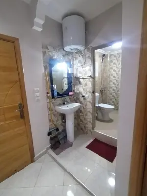 a bathroom with a sink and a toilet at Maison d'hôte Najah 2 in Khenifra