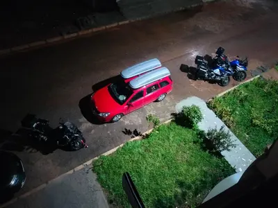 an aerial view of motorcycles and a car with a tent on top at Maison d'hôte Najah 2 in Khenifra
