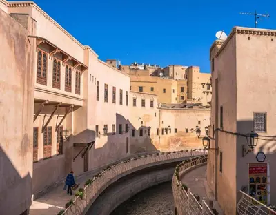an alley in a city with buildings at Home Louah Apartment Retreat in Oulad Tayeb