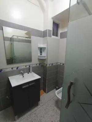 a bathroom with a sink and a toilet at appartement splendid au centre ville in Fès