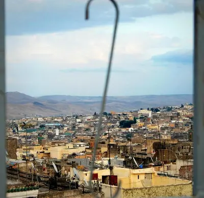 a view of a city from a window at Dar Tadla Fes in Fès