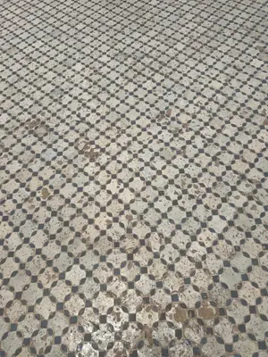 a close up of a tile floor with a pattern at Riad Fès City in Fès