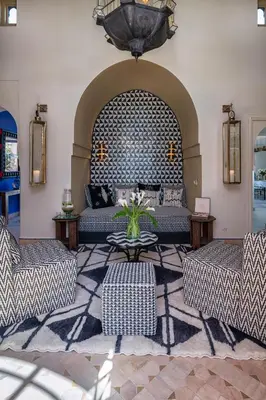 a living room with a couch and a table at Luxurious Villa with private pool - Kasbah Conti in Marrakech