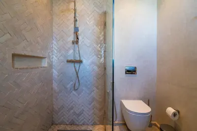 a bathroom with a shower with a toilet at VILLA 2s in Marrakech