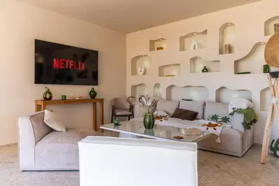 a living room with a couch and a table at VILLA 2s in Marrakech