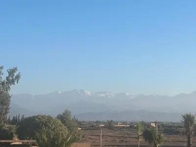 a view of a mountain range with mountains in the distance at VILLA 2s in Marrakech
