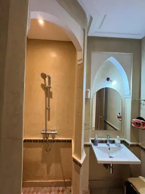 a bathroom with a sink and a mirror at Beautiful Villa near Marrakesh in Marrakech