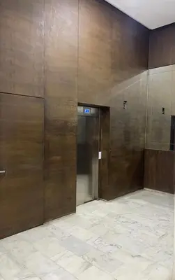 a elevator in a building with a door at Luxueux appartement centre ville wifi 200 Mo in Fès