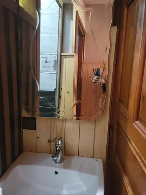 a bathroom with a sink and a mirror at Ourika atlas home in Setti Fatma