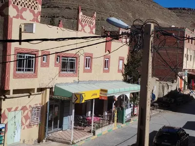 a street light in front of a building at almou auberge imilchil in Imilchil