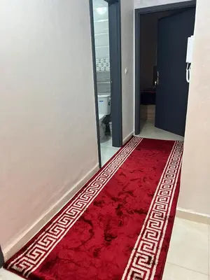 a red carpet in a bathroom with a red floor at حي الامل بني ملال in Beni Mellal