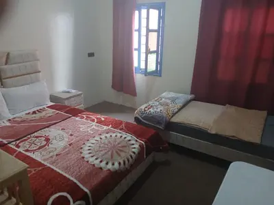 a bedroom with two beds and a window at Gite ritch in Rich
