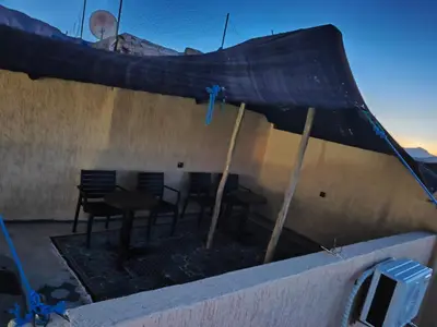a view of a roof with chairs and a table at Gite ritch in Rich