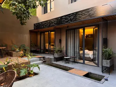 a house with a courtyard with a bedroom at Penthouse-fes in Fès