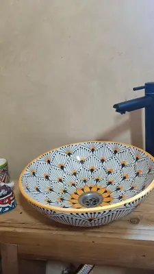 a sink on top of a wooden table at Dar Ayoub in Fès