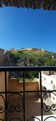 a view from a balcony with a view of a city at Riad zineb in Fès
