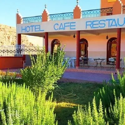 a hotel with a sign that reads hotel gate residency at Hotel Boutaghrar in Kalaat MGouna