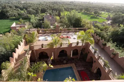 an aerial view of a house with a swimming pool at Riad Rayhana De L Atlas in Ourika