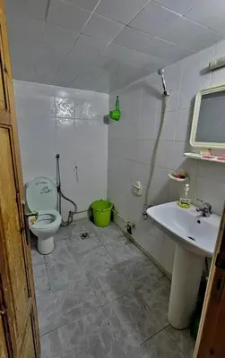 a bathroom with a toilet and a sink at Apartment low price good location in Fès