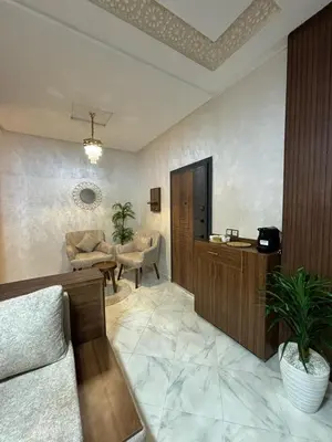 a living room with a couch and a chair at إقامة جنان كاميليا مكناس in Douar Sidi Cherki