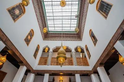 an overhead view of the ceiling of a mosque at Riad Old City Palace in Fès