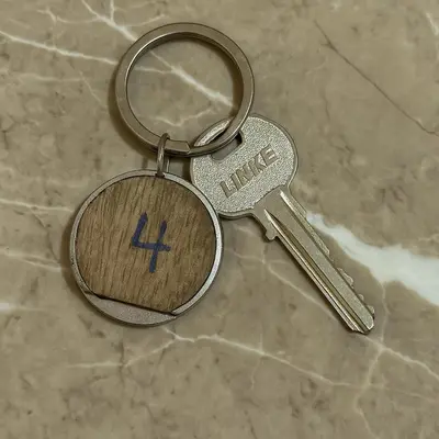 a pair of keys with the letter h on it at Residence Kawtar Meknès Marjane 2 in Meknès