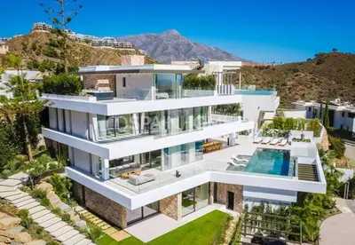 an aerial view of a house with a swimming pool at Tanger in Oulad Akkou