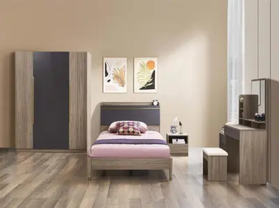 a bedroom with a bed and a tv in it at Tanger in Oulad Akkou