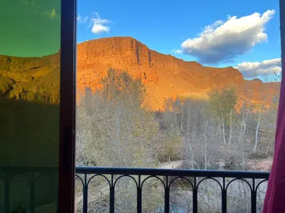 a view of a mountain from a window at Kasbah Ait Marghad in Aït Ougliff