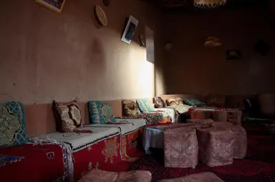 a living room with couches and tables in a room at Maison d'Hôte La Roche Noire in Fint